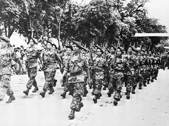 Third Battalion of the Vietnam Parachute Regiment in the parade through the streets of Hanoi.June 12 1954